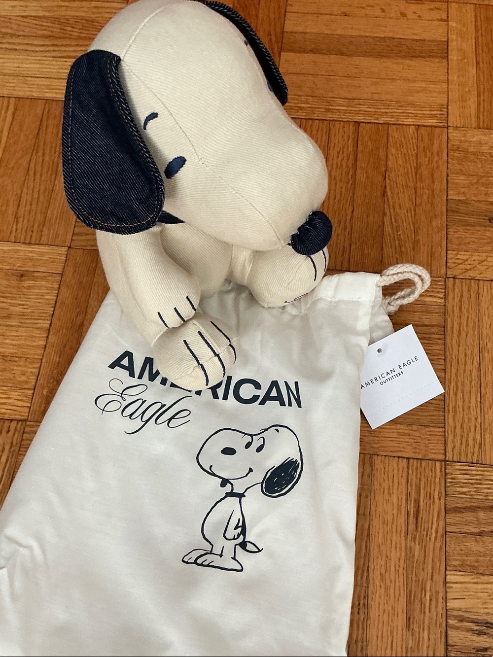 American Eagle limited edition blue jeans Snoopy with bag, new